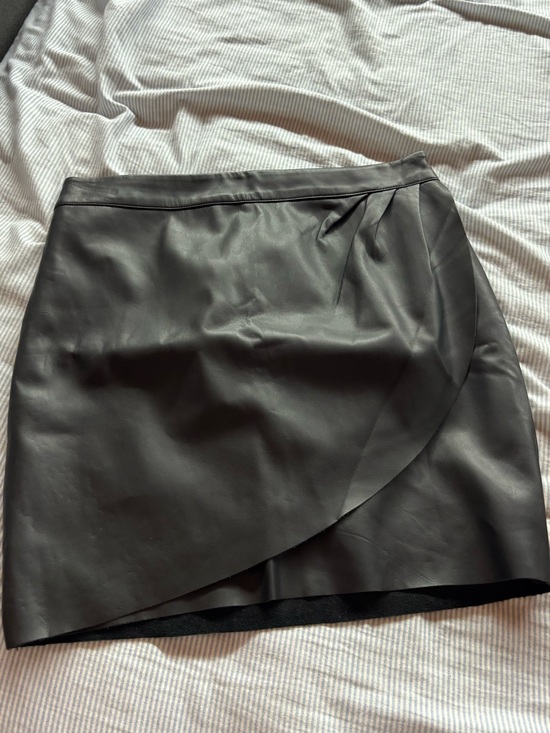 Express Dresses & Skirts - NWT Express Black Faux Leather Wrap Front Mini Skirt
